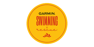 Okrągła żółta plakietka z napisem „GARMIN SWIMMING & rescue”, czerwoną ikoną pływaka oraz danymi kontaktowymi Kuby Konwenta.